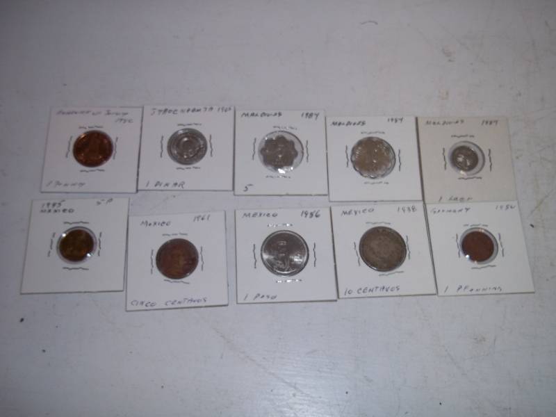 lot 384 image: 10 Foreign Coins