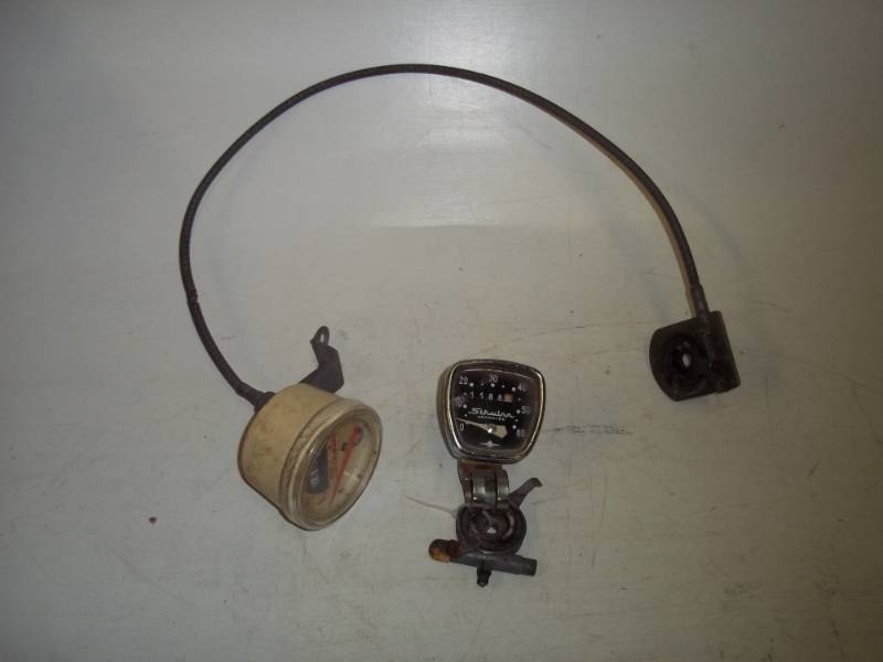 lot 430 image: Pair of Vintage Schwinn Bike Speedometers