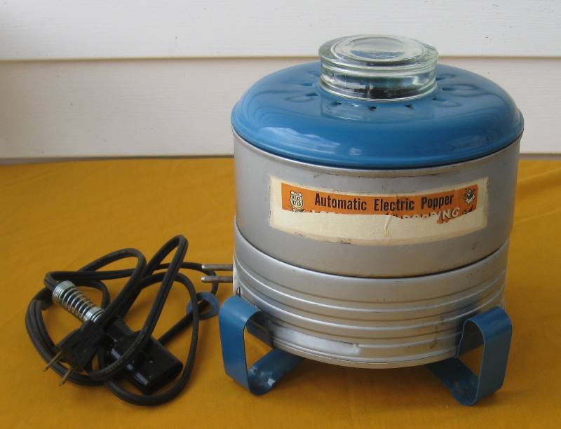 lot 016 image: Vintage Blue & Silver Electric Popcorn Popper & Coleman Gas Iron
