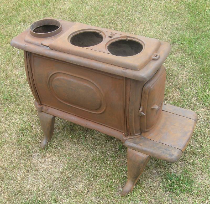 lot 001 image: Vintage Sears Cast iron Wood Stove