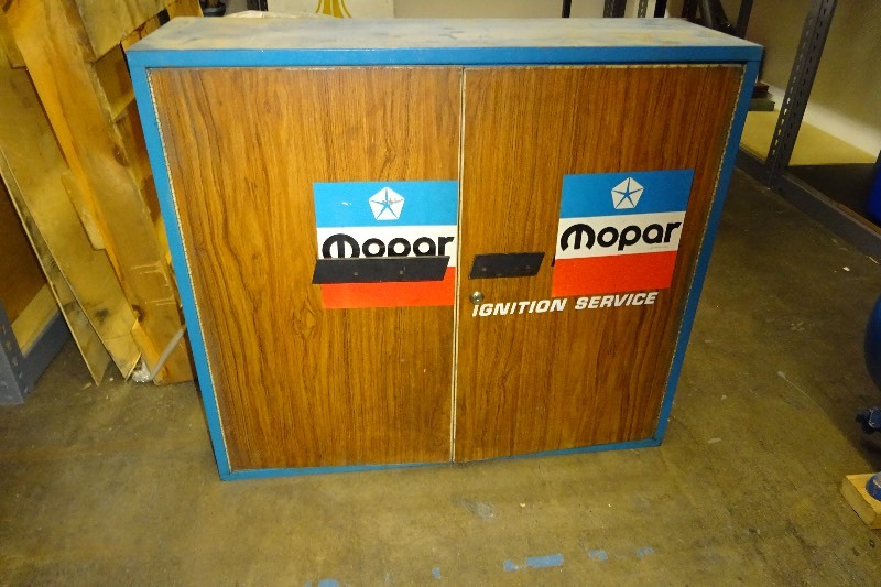 lot 54 image: Mopar tin cabinet