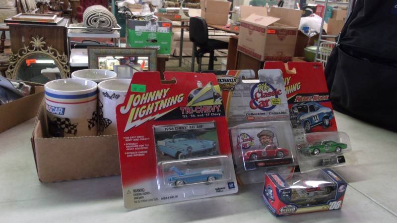lot 36 image: Nascar Mugs and toy cars