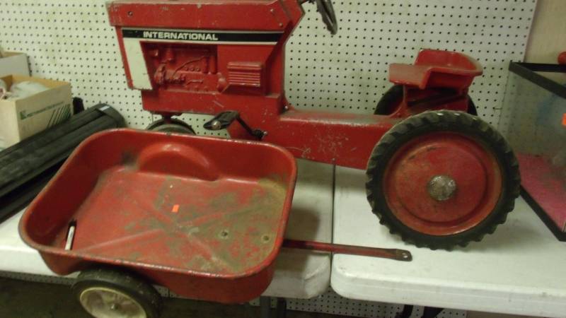 lot 48 image: International Pedal Tractor and wagon