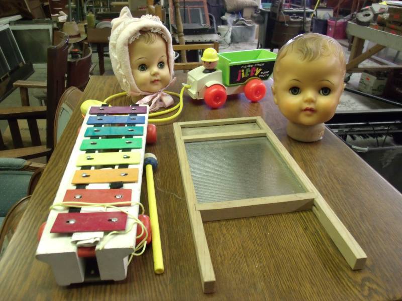 lot 68 image: Vintage Toys, doll heads and washboard