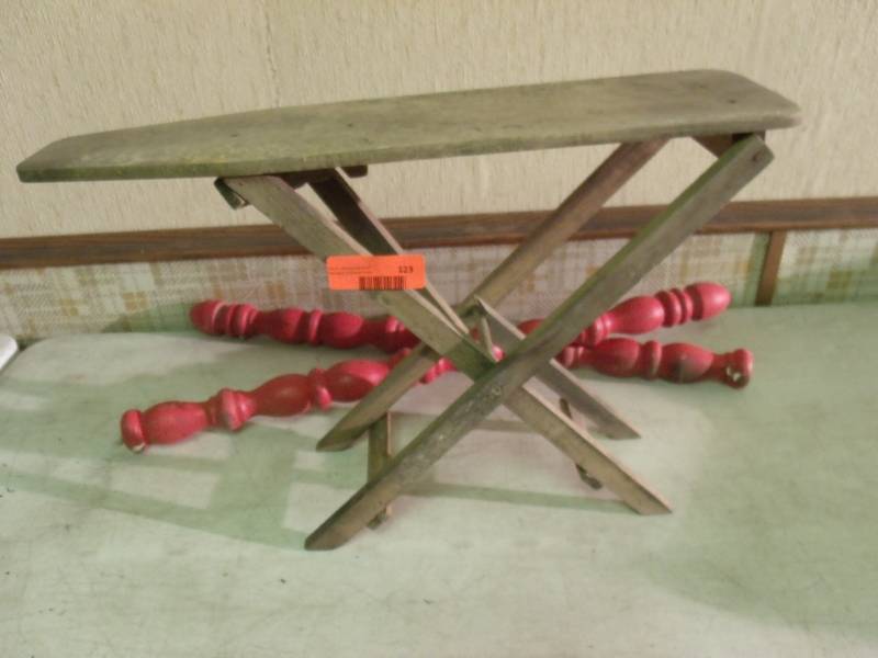 lot 123 image: Old Childs Ironing Board and 2 red spindles