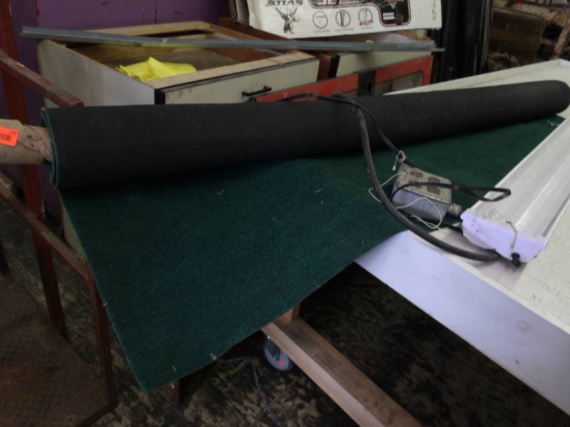 lot 142 image: Outdoor Carpet, electrical outlet and light fixture
