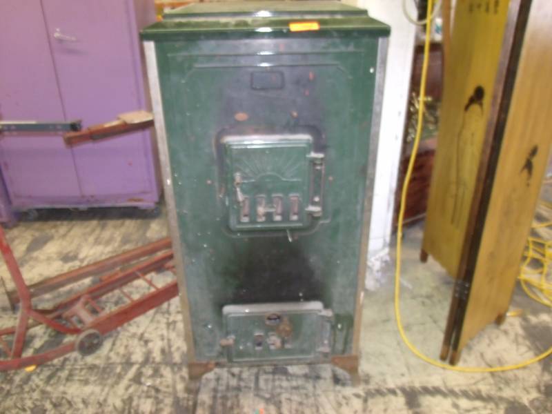 lot 143 image: Old wood burning stove