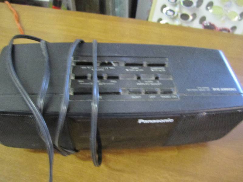 lot 147 image: Panasonic clock radio...