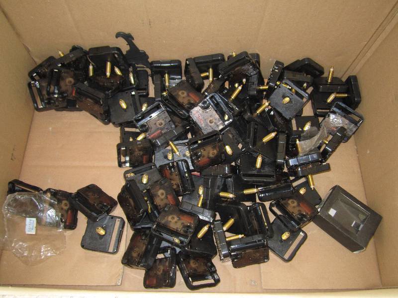 lot 6 image: Small box of clock hand dials, batt...