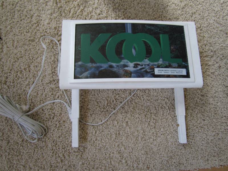 lot 11 image: Kool sign with cord...