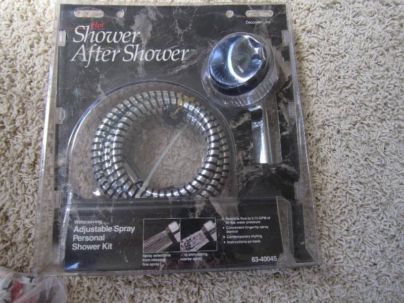 lot 22 image: Adjustable shower head...