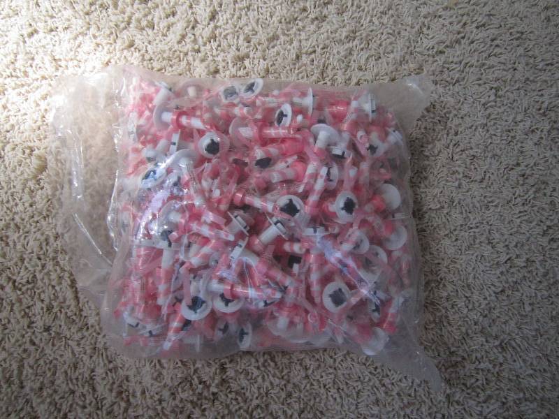lot 23 image: Baloon strings...