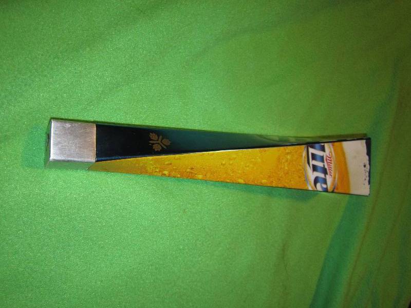 lot 34 image: Miller Lite beer tap...