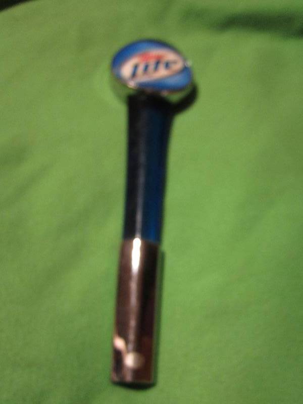 lot 40 image: Miller Light beer tap...