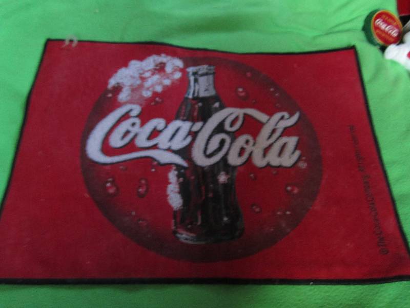 lot 102 image: Coca-cola placemat...