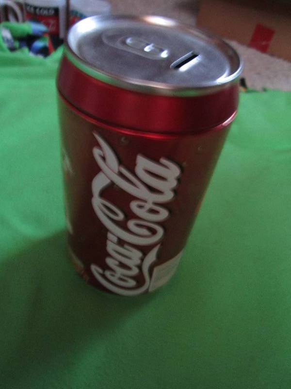 lot 107 image: Coca-cola piggy bank...