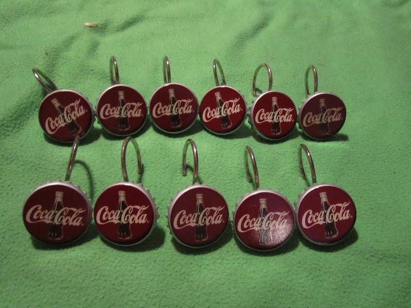 lot 113 image: Coca-cola shower curtain hangers se...