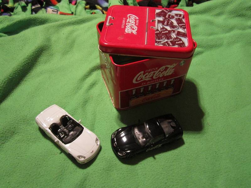 lot 116 image: One Coca-cola tin and 2 collector c...