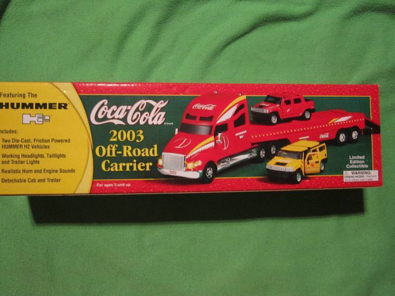lot 122 image: Coca-cola 2003 off road carrier rep...