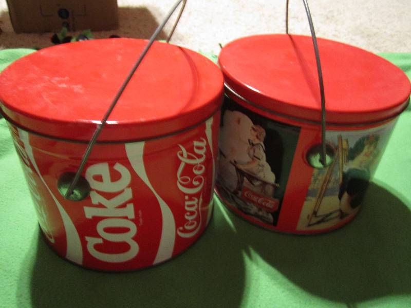 lot 129 image: 2 Coca-cola tins with handles...