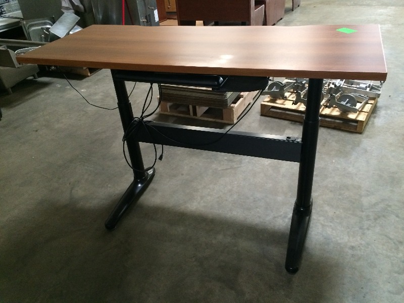 Adjustable desk - lifts to 40 high and lowers to 26   Measures 60 wide x 24 Deep  x 26-40 high   works