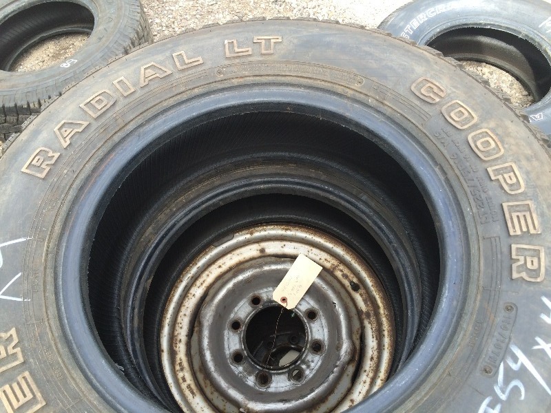 lot 54 image: Cooper Tires & rims  LT22575R 16  (2) with 8 hole Chev rims and (2) Tires only no rims   Lot of 4