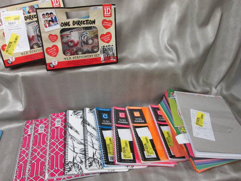 lot 1 image: Notebooks, Outdated planners, Const...