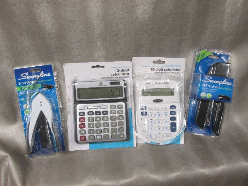 lot 14 image: 2 Swingline Staplers, 2 calculators...