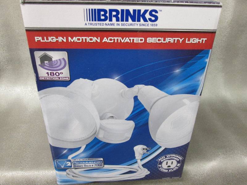 lot 63 image: Brinks Plug-in Motion Activated Sec...