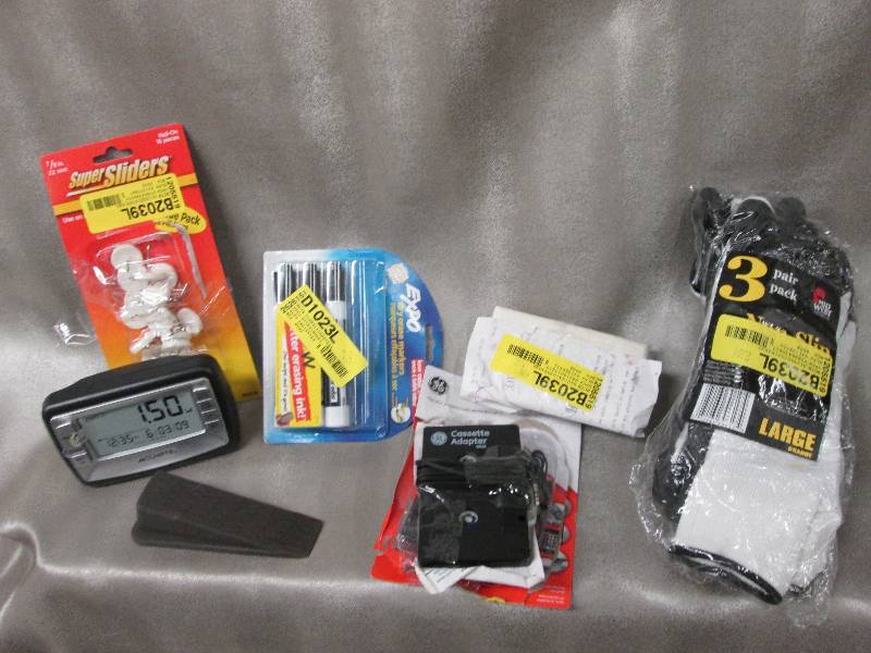 lot 79 image: Nail-on sliders, door stop, battery...