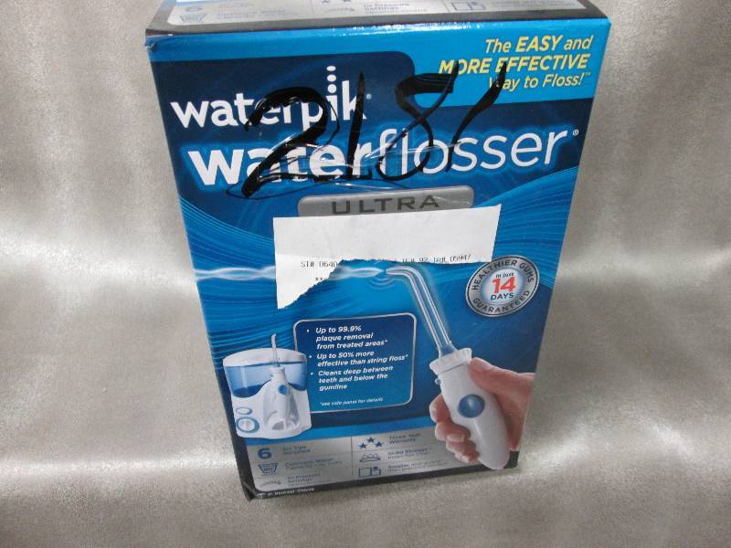lot 95 image: Waterpik WaterFlossser- used...