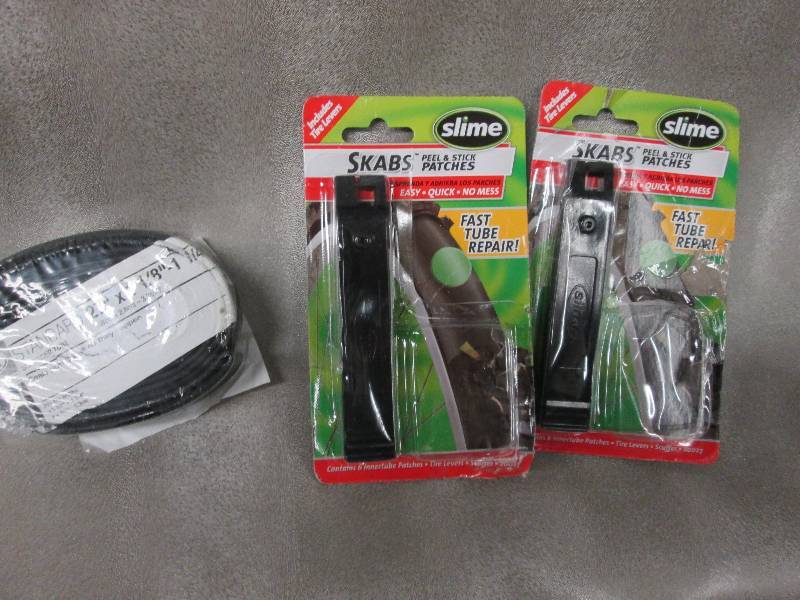 lot 127 image: Bell 27 inch bike tube, 2 repair ki...