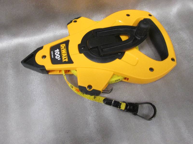 lot 132 image: DeWalt 100 ft contractors tape meas...