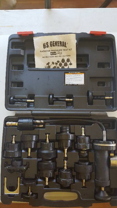 lot 9 image: 16 Piece Radiator Pressure Tester. Model#65053