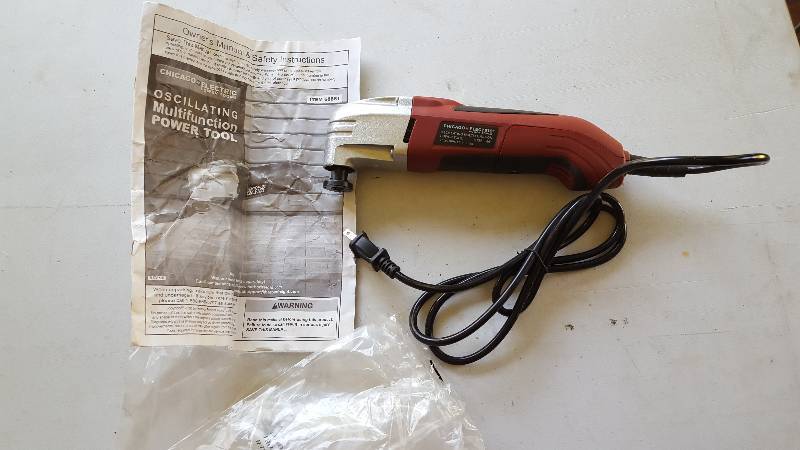 lot 28 image: Oscillating multi-function power tool. Model#68861
