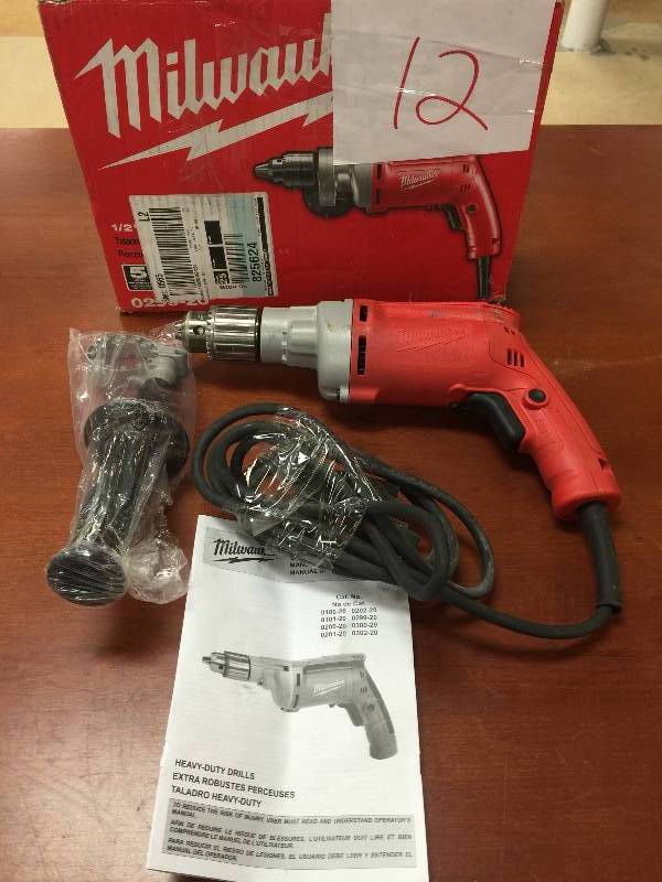 lot 12 image: Milwaukee  8 Amp 12 in. Magnum Drill Model # 0299-20 in like new working conditions