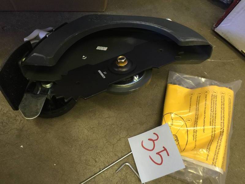 lot 35 image: Ryobi Expand-It 9 in. Universal Straight Shaft Edger Attachment for String Trimmer New