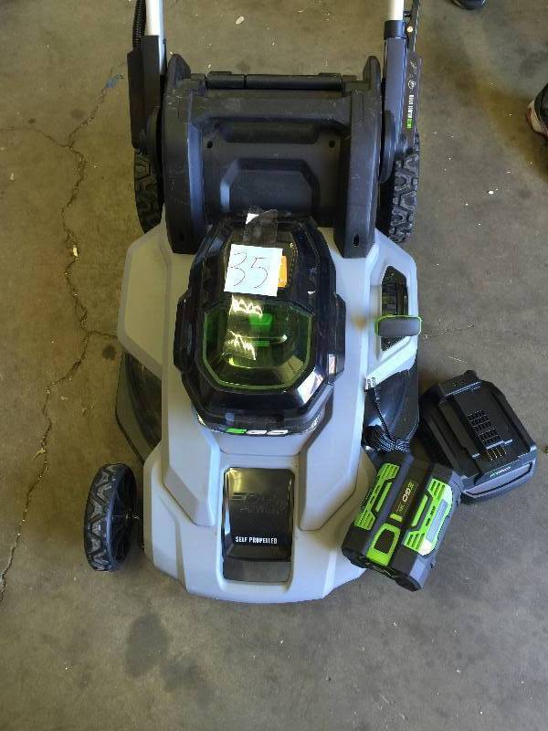 lot 36 image: Ego 21 in. 56-Volt Lithium-Ion Cordless Self Propelled Lawn Mower working conditions battery an charger are include