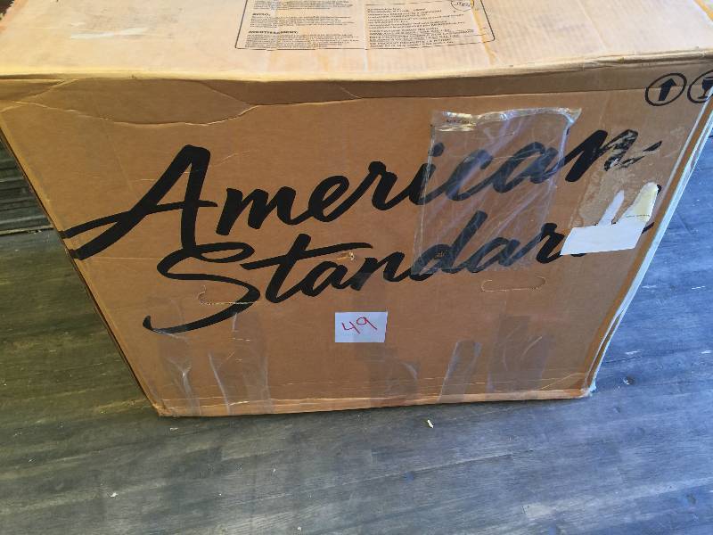 lot 49 image: American Standard Fairfield 1-piece 1.6 GPF Single Flush Elongated Toilet in White with Seat Model # 2862.056.020 New