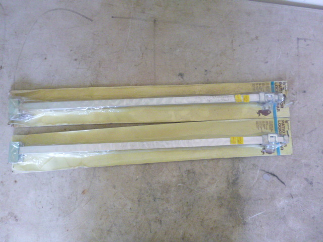lot 269 image: 2 Patio Door Locking Bars
