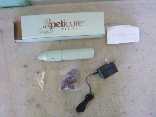lot 275 image: Peticure Petite Cordless Pet Nail Groomer