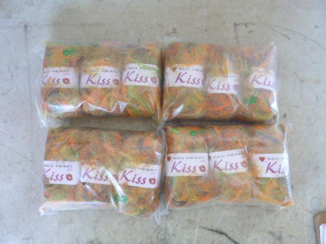lot 323 image: 4 Packs of Red Heart Kiss Yarn