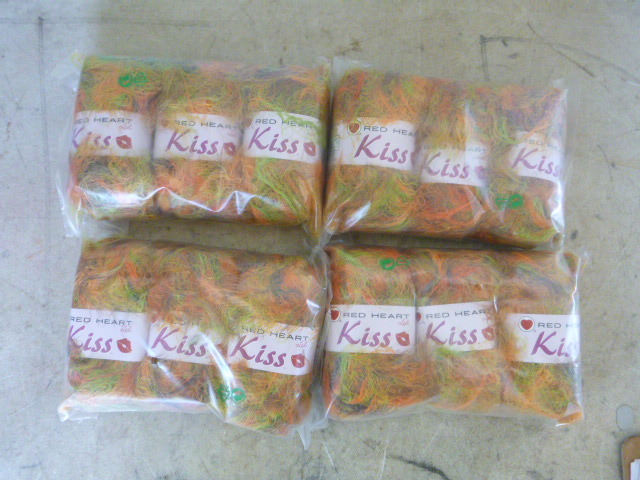 lot 324 image: 4 Packs of Red Heart Kiss Yarn