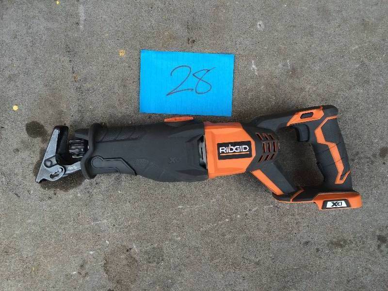 lot 28 image: RIDGID X4 18-Volt Cordless Reciprocating Saw Console (Tool Only) Model # R8641 in working conditions