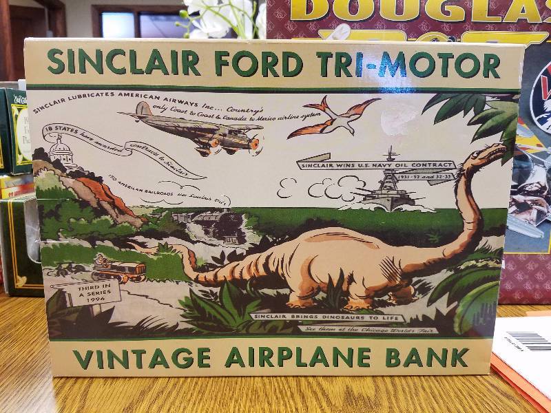 lot 1 image: Sinclair Die Cast Plane Bank