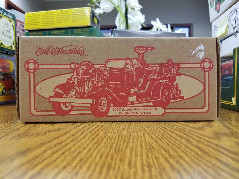lot 7 image: 1937 Ahrens-Fox Firetruck Die Cast by Ertl