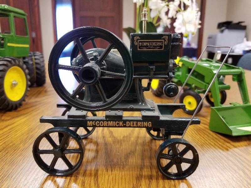 lot 45 image: McCormick Deering Ertl Hit Miss Stationary Engine Farm Toy Die Cast