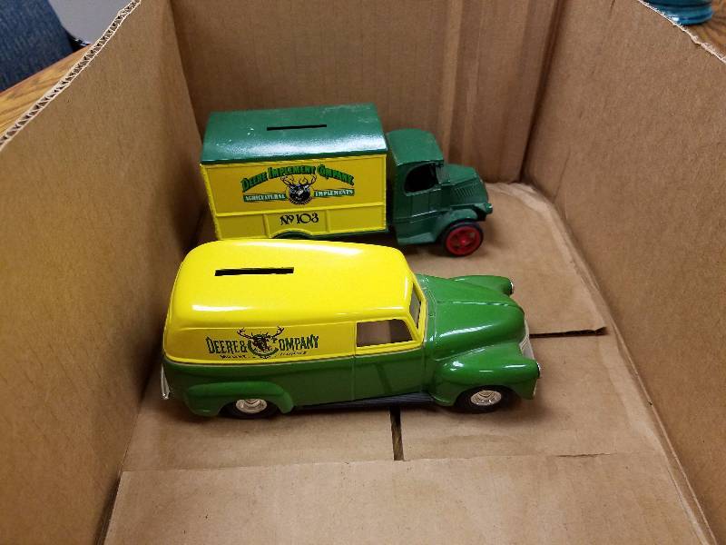 lot 48 image: Pair of John Deere Die Cast Banks