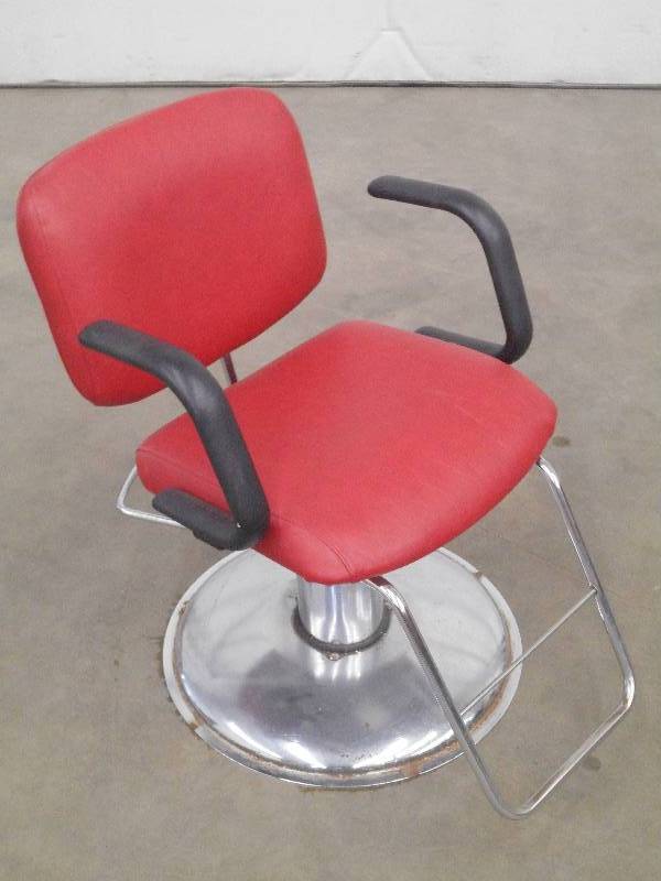 Adjustable Swiveling Barbers Chair ...