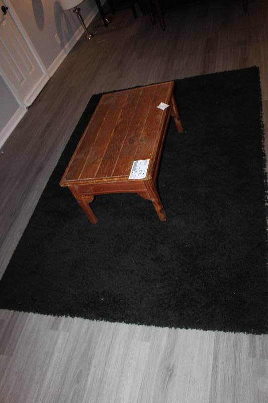 lot 23 image: Coffee Table w Rug